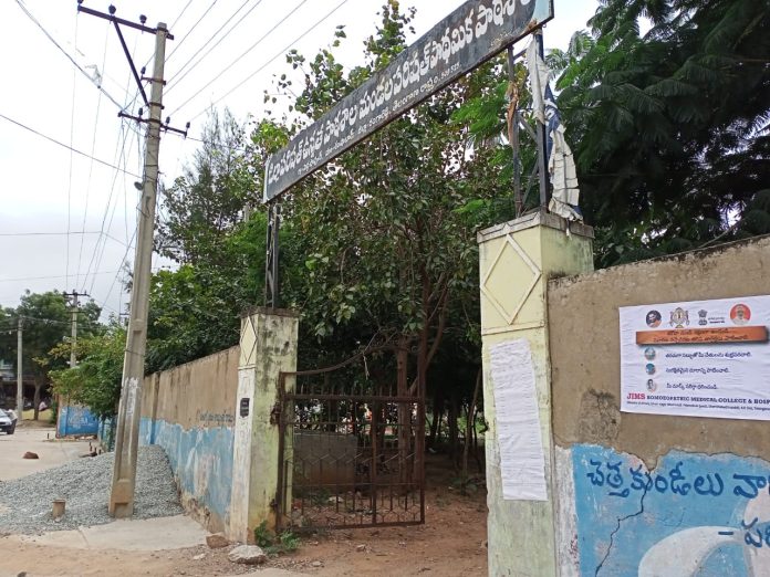 Janandolan Campaign On COVID 19 - IEC Poster Sticking At Peddashapur Of Shamshabad Mandal